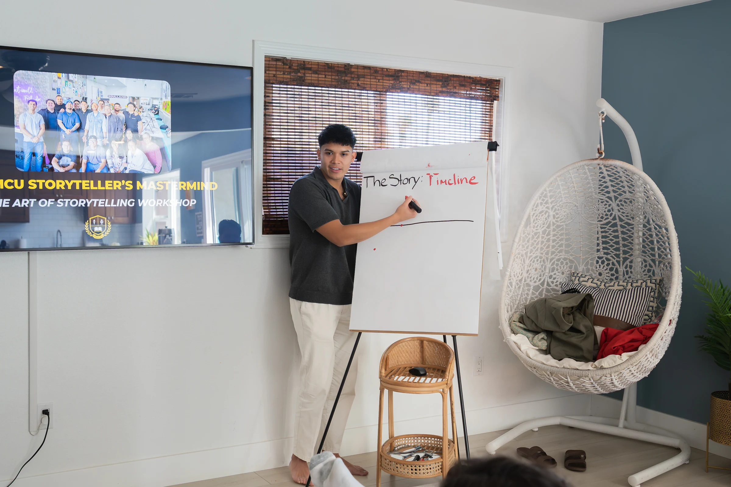 Eliam teaching at the whiteboard during the last Mastermind