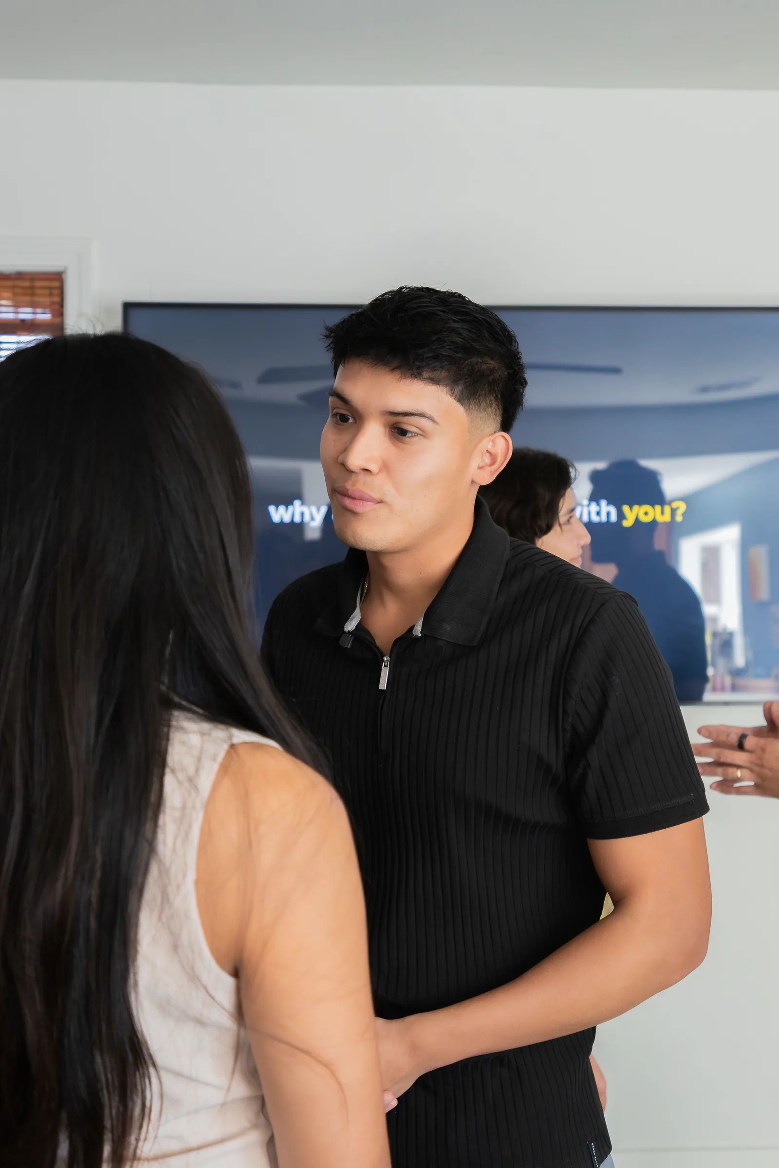 Eliam coaching a participant one on one